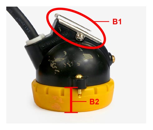 El falso: lampara minera clip es de hierro y níquel en la superficie; la cabeza cubierta de la lámpara es mucho más amplio